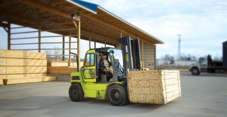 How Do You Know When to Update Your Forklift Fleet? Featuring a yellow Clark forklift.