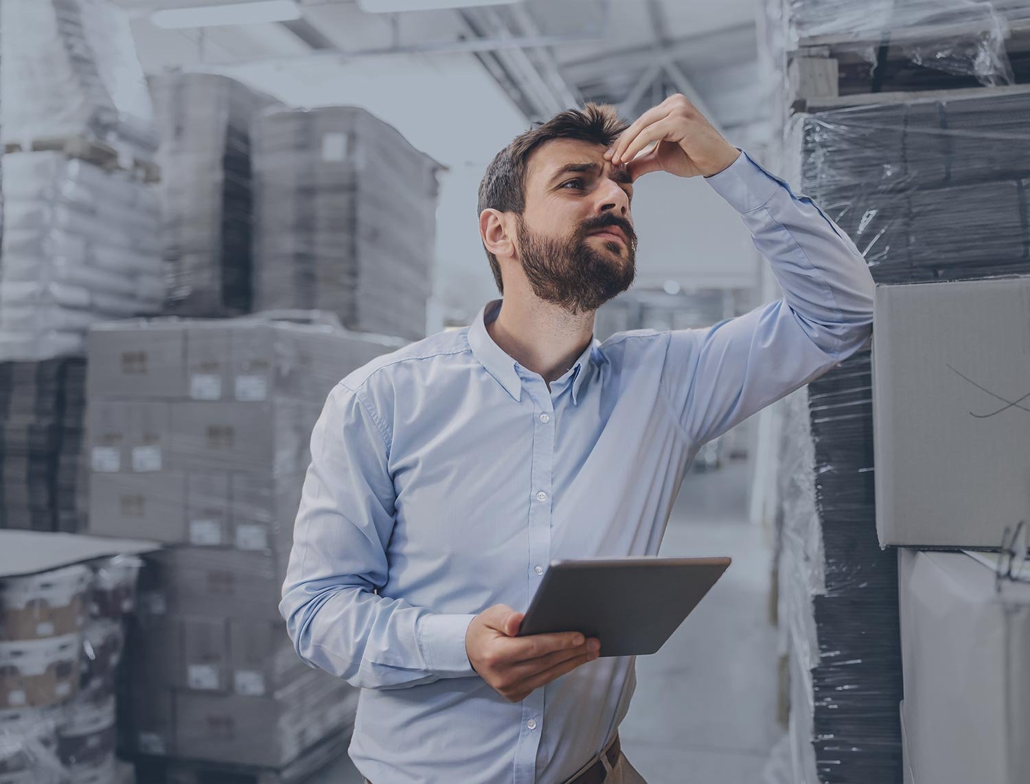 Stressed Warehouse Manager in Messy Warehouse