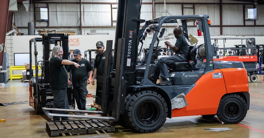 Lilly Forklift Mechanics In Warehouse